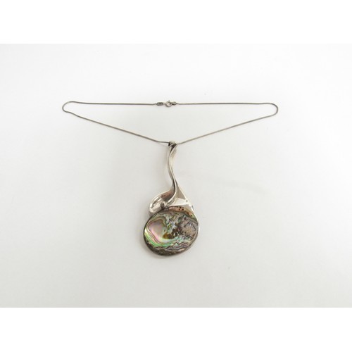 9234 - A sterling silver modernist mid century pendant with aberlone shell decoration, marked 925