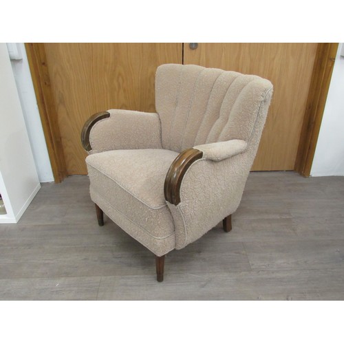 9276 - A 1940's Danish armchair original embossed upholstery in oatmeal colours, dark stained wooden arms a... 