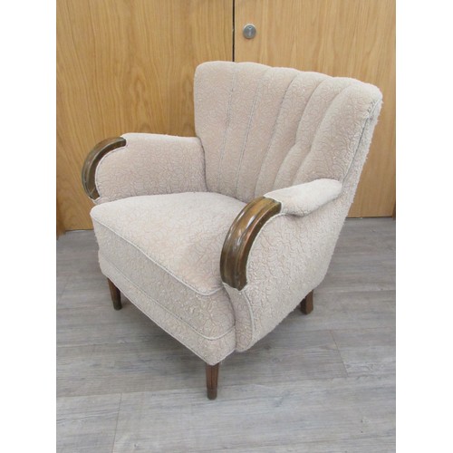 9276 - A 1940's Danish armchair original embossed upholstery in oatmeal colours, dark stained wooden arms a... 