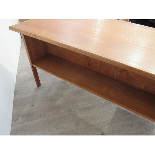 9286 - A Danish teak twin pedestal desk with seven drawers, open 'book shelf' back. 146cm x 76cm x 72.5cm h... 