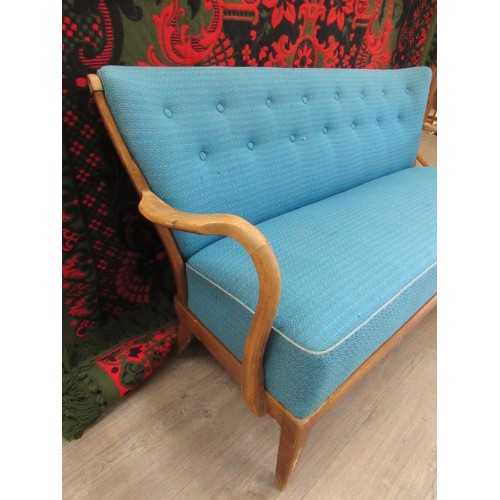 9299 - A 1940's Danish three seater sofa with original turquoise upholstery, stained beech arms, base and l... 