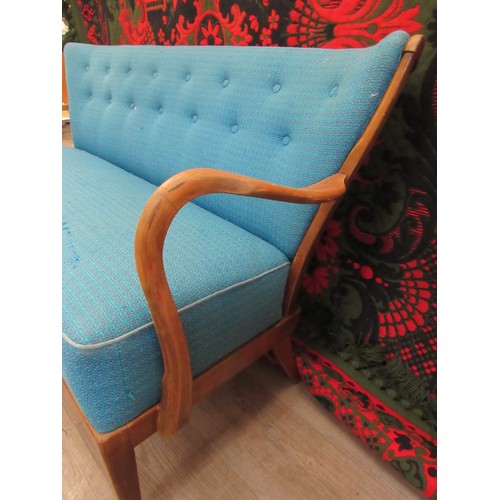 9299 - A 1940's Danish three seater sofa with original turquoise upholstery, stained beech arms, base and l... 