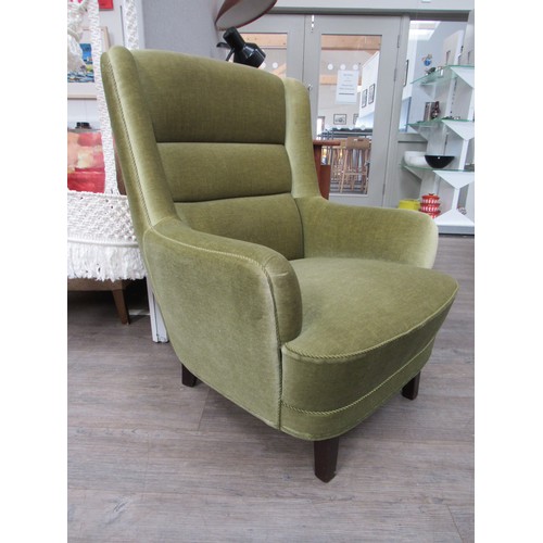 9328 - A 1940's Danish armchair in original green velour upholstery, dark stained short legs. 72cm x 86cm x... 