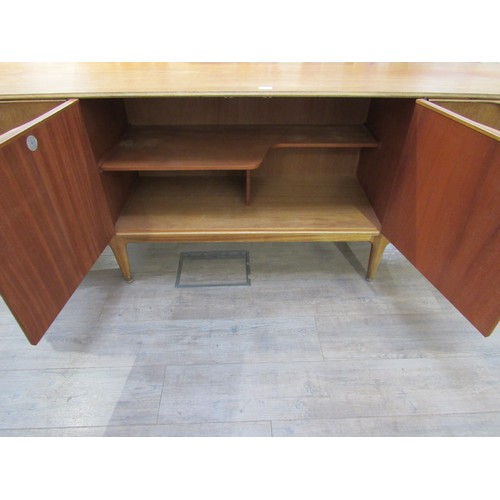 9345A - A Mcintosh Furniture sideboard with three cupboard doors and three drawers. 201.5cm x  49cm x 77cm h... 