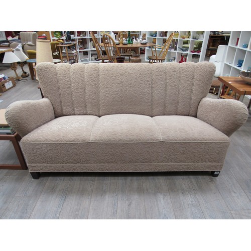 9367 - A 1940's Danish three seater sofa with original oatmeal colour embossed foliate fabric on dark stain... 