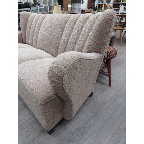 9367 - A 1940's Danish three seater sofa with original oatmeal colour embossed foliate fabric on dark stain... 