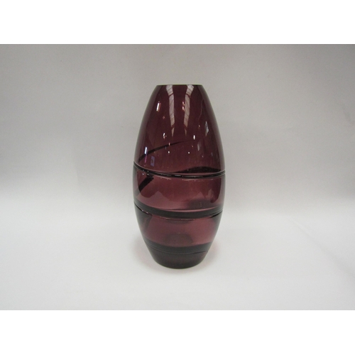 1268 - An amethyst coloured glass vase, 30cm high