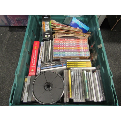 1542 - Two boxes containing a collection of 7'' singles, CD's and DVD's