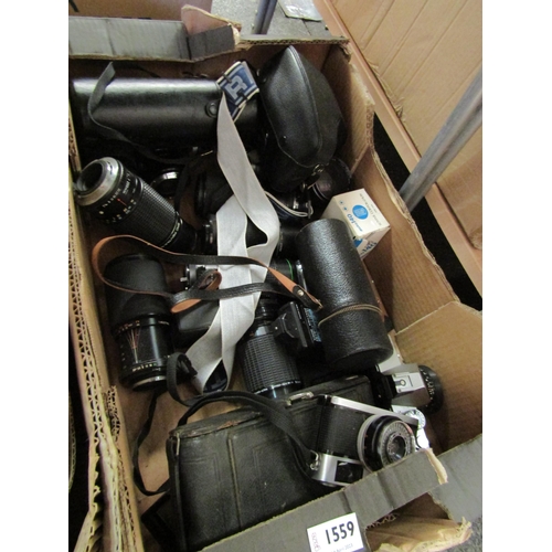 1559 - A box of assorted cameras and accessories including Nikon F-401X with case, Praktica MTZ3, various l... 