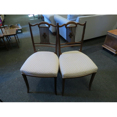 1018 - A pair of Edwardian dining/salon chairs