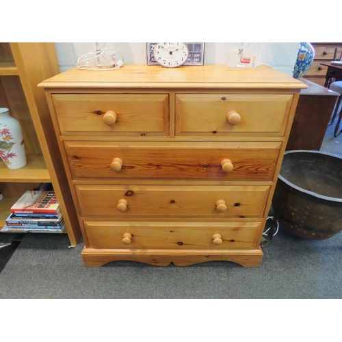 1023 - A modern pine chest of two short over three long drawers, shaped plinth base, 93cm high x 92cm wide ... 