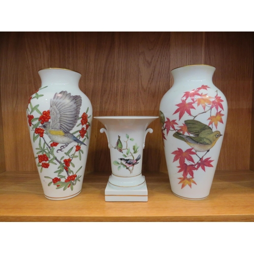 1028 - A pair of Franklin porcelain Ryu, Japan (1981) vases decorated with birds amongst tree branches, 29.... 