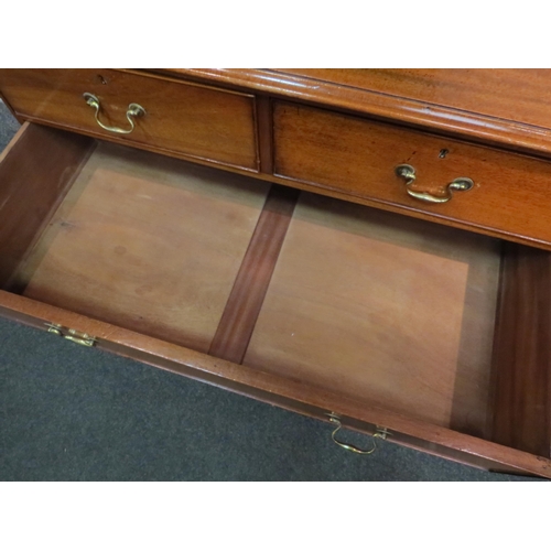 1056 - A Victorian mahogany chest of two short over two long drawers, set with brass swan neck handles, on ... 