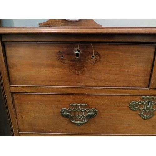 1098 - A Georgian mahogany chest of two short over three long drawers, reeded canted corners, ogee bracket ... 