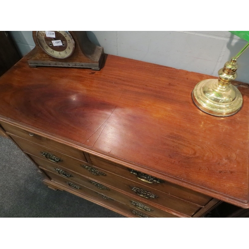 1098 - A Georgian mahogany chest of two short over three long drawers, reeded canted corners, ogee bracket ... 