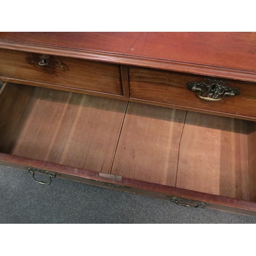 1098 - A Georgian mahogany chest of two short over three long drawers, reeded canted corners, ogee bracket ... 