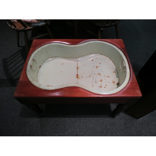 1105 - A Victorian mahogany side table with enamelled tin child's wash bath interior under tabletop cover