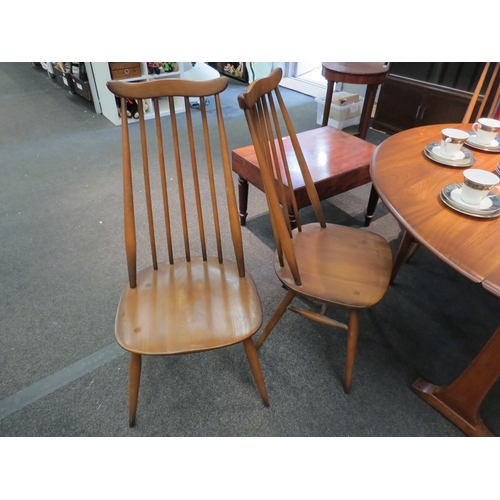 1107 - An Ercol drop-leaf dining table and set of four high stick back dining chairs (5)