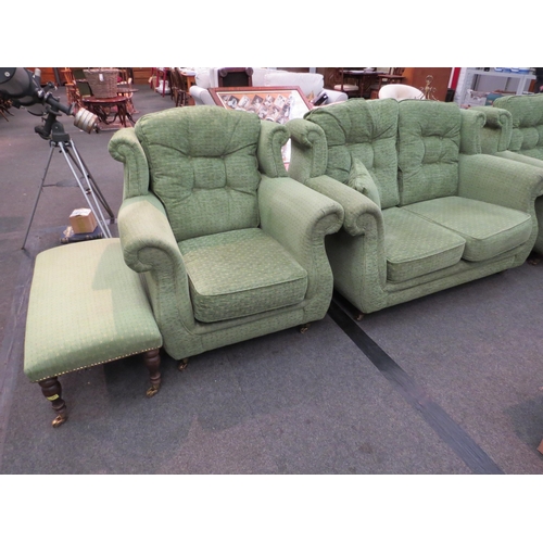 1179 - A green upholstered three piece suite with matching stool, on castors   (E) £20-30