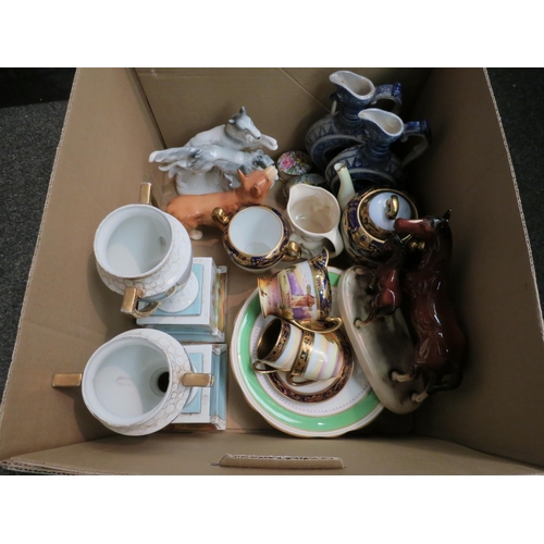 1244 - A box of ceramics including Continental urns, lurcher dogs, horses, Corgi dog, Czech part tea set, e... 