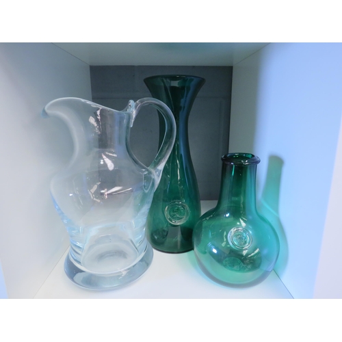 1274 - A large Studio glass jug, a tall green glass carafe with horse impressed seal to side and similar va... 