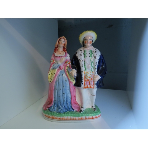 1280 - A Victorian Staffordshire pottery figure of Henry VIII and Anne Boleyn, C.1850, well coloured in pol... 