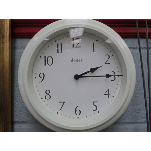 1289 - A Jones Company wall clock, 30cm diameter