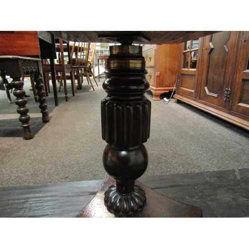 1091 - A Regency style tripod pedestal music stool