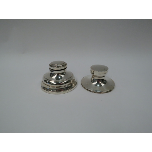 1302 - Two silver inkwells (weighted base, dented)