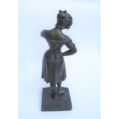 8086 - A Continental bronze figure of seductive posing girl in dress, vacant cartouche to base, 25.5cm tall... 