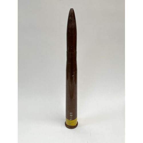 9008 - A British 1957 dated L20A1 drill shell, 53.5cm tall