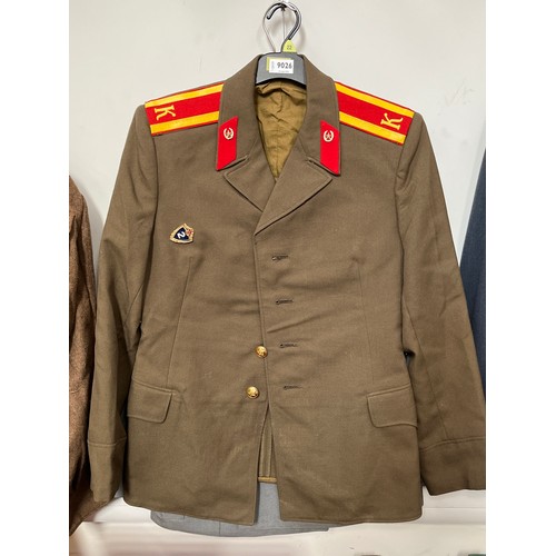 9026 - A Soviet Russian officer’s jacket together with a post war German Luftwaffe officer’s jacket (2)