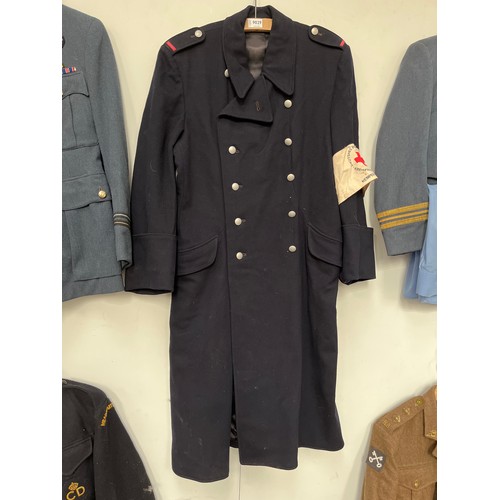 9029 - A WWII Red Cross woman's coat with arm band      (C)