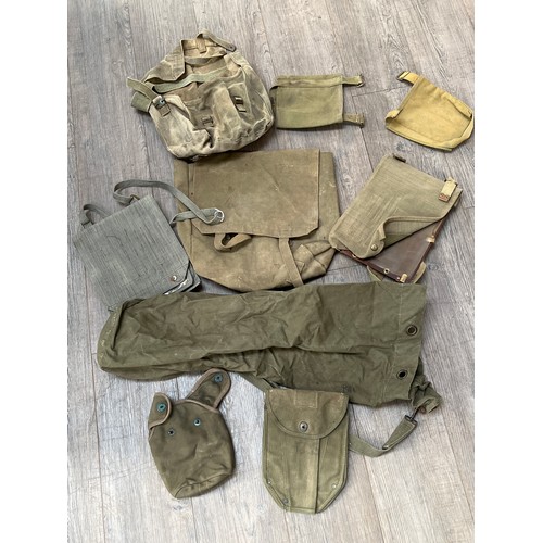 9038 - A box of mixed military equipment, including WWII