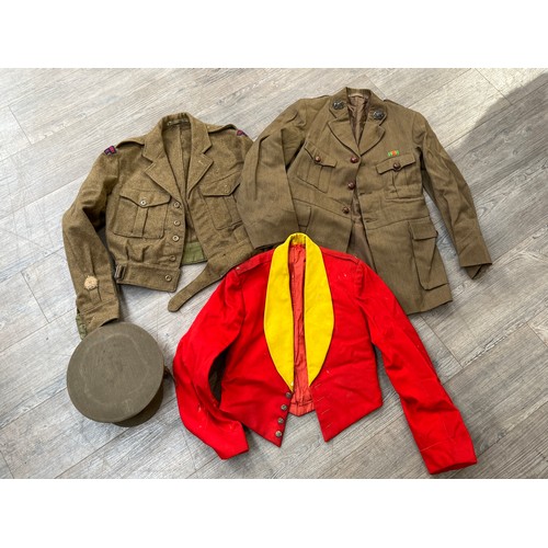 9052 - A WWII Service Dress jacket, buttons replaced, with Defence medal ribbon, crown badge, together with... 