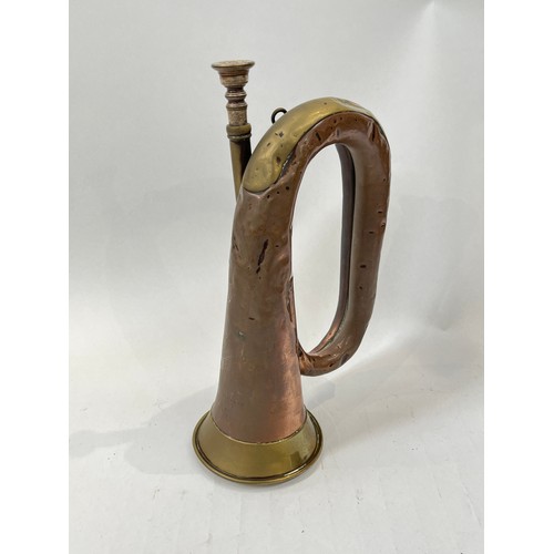 9059 - A WWI 1917 dated Boosey & Co. military bugle