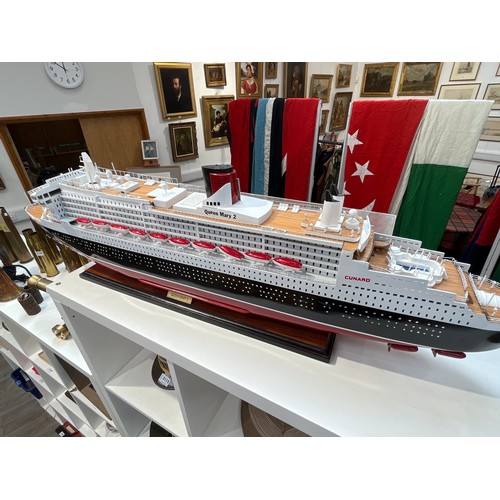 9110 - A model of Queen Mary II ocean liner, 98cm long