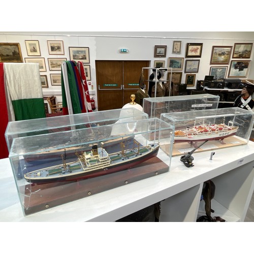 9507 - Five models of ships in display cases