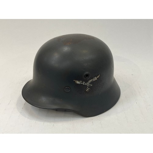 9123 - A reproduction German Luftwaffe double decal helmet with lining     (C)