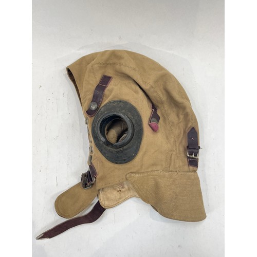 9124 - A Fleet Air Arm Flying helmet, canvas and leather, some moth damage, another slightly later model, l... 