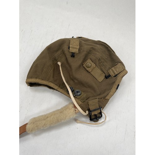 9124 - A Fleet Air Arm Flying helmet, canvas and leather, some moth damage, another slightly later model, l... 