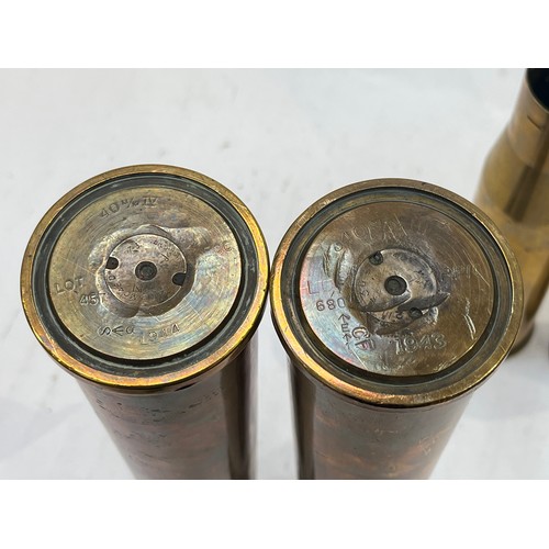 9139 - Two WWII 40mm Bofors shells, dated 1944 and 1943, tops flared, together with two WWII 37mm M16 anti-... 