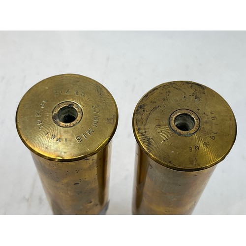 9139 - Two WWII 40mm Bofors shells, dated 1944 and 1943, tops flared, together with two WWII 37mm M16 anti-... 