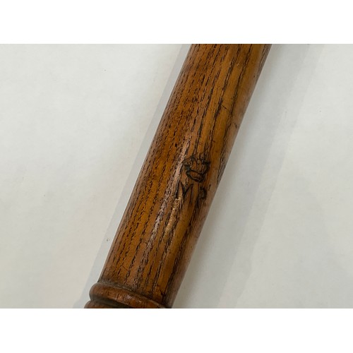 9175 - A Military Police wooden truncheon with stamps in two places