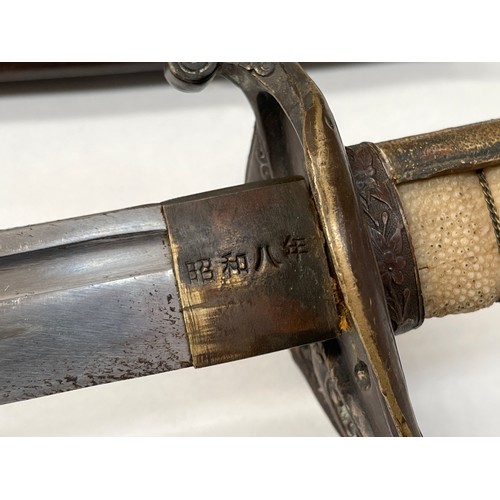 9191 - A Japanese Army Kyu Gunto sword, circa 1933, ray skin grip with brass hilt, single fuller blade, wit... 