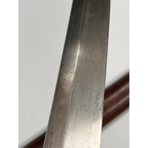 9192 - A Japanese Shin Gunto Katana, textile and leather wrap grip, gilt metal plain tsuba, leather scabbar... 