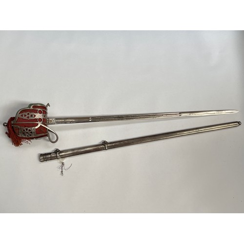 9203 - A reproduction Scottish basket hilted broadsword, thistle and King's crown design to twin fuller bla... 