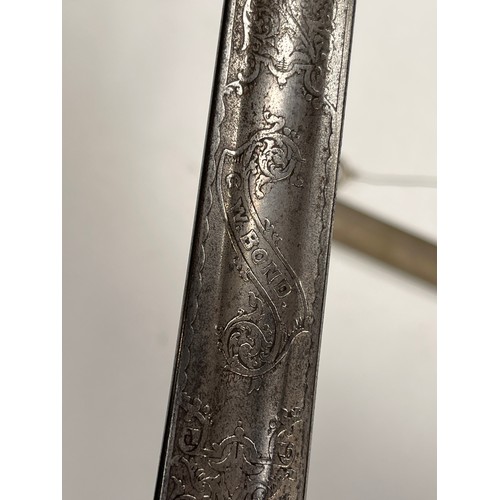 9205 - An 1827 pattern early 20th Century British rifle officer's sword, the blade engraved with scrolled d... 