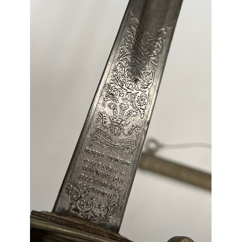 9205 - An 1827 pattern early 20th Century British rifle officer's sword, the blade engraved with scrolled d... 