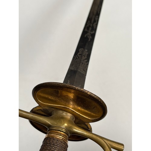 9206 - A late 18th Century and later officer's sword in the 1796 pattern style, the double-edged tapering b... 